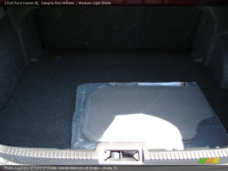 Sangria Red Metallic / Medium Light Stone 2010 Ford Fusion SE