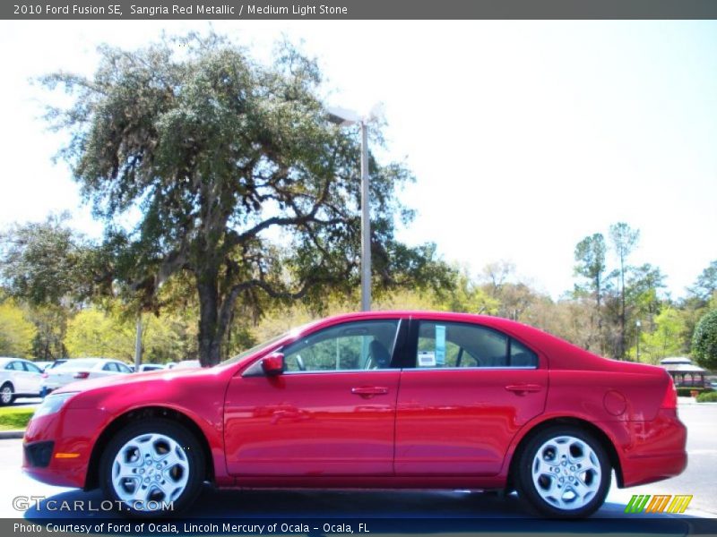 Sangria Red Metallic / Medium Light Stone 2010 Ford Fusion SE