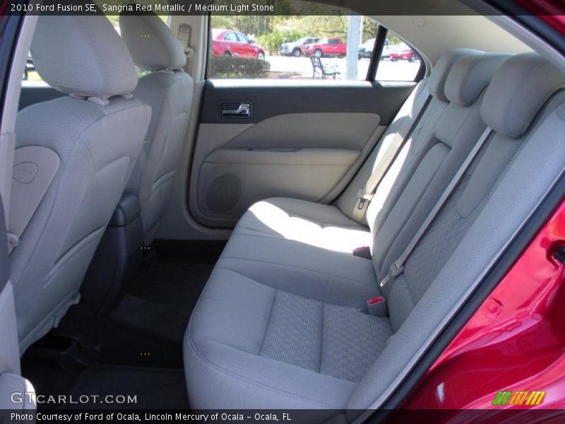 Sangria Red Metallic / Medium Light Stone 2010 Ford Fusion SE