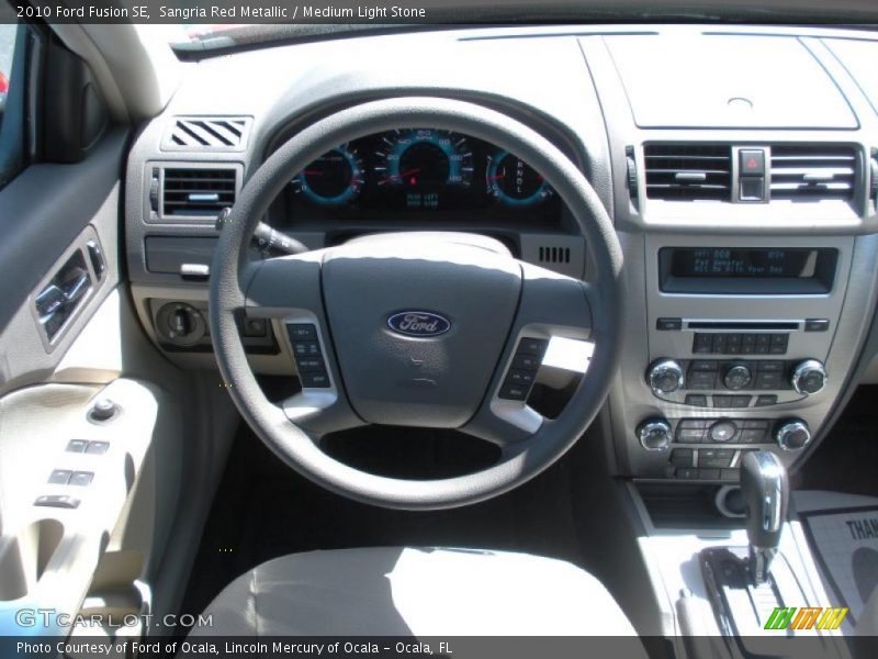 Sangria Red Metallic / Medium Light Stone 2010 Ford Fusion SE