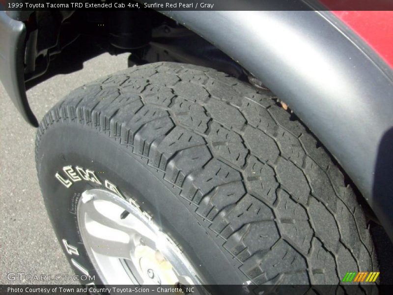 Sunfire Red Pearl / Gray 1999 Toyota Tacoma TRD Extended Cab 4x4