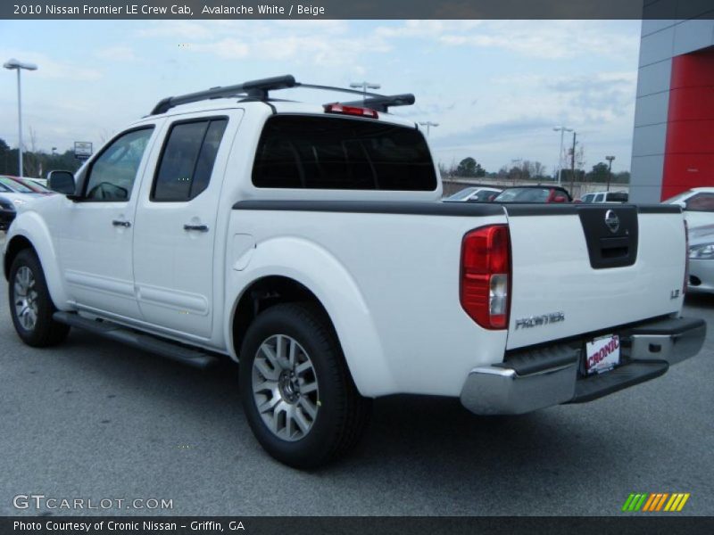 Avalanche White / Beige 2010 Nissan Frontier LE Crew Cab
