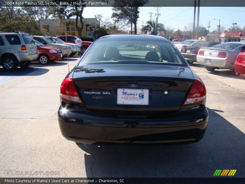 Black / Medium Parchment 2004 Ford Taurus SEL Sedan