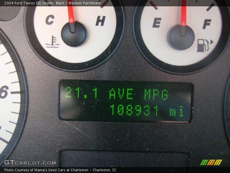 Black / Medium Parchment 2004 Ford Taurus SEL Sedan