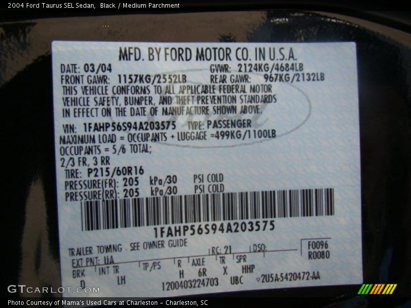 Black / Medium Parchment 2004 Ford Taurus SEL Sedan