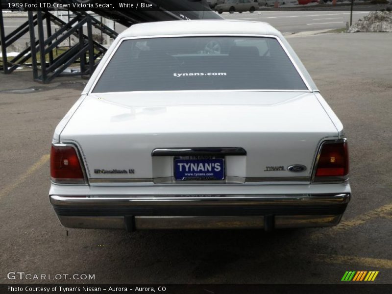White / Blue 1989 Ford LTD Crown Victoria Sedan