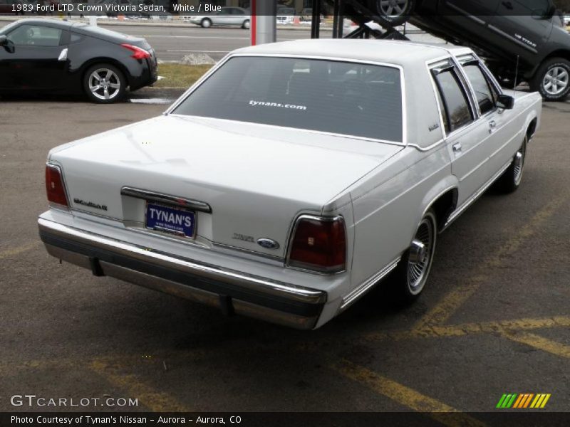 White / Blue 1989 Ford LTD Crown Victoria Sedan
