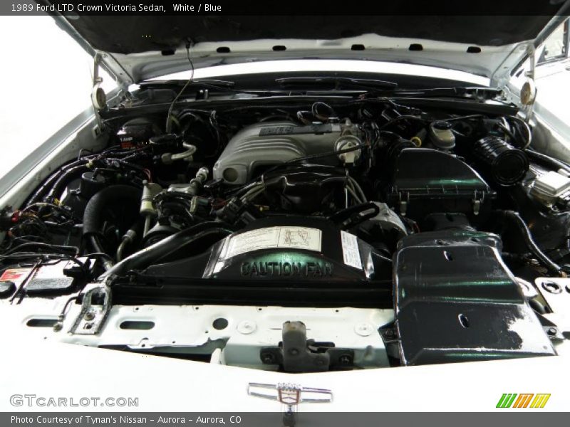 White / Blue 1989 Ford LTD Crown Victoria Sedan