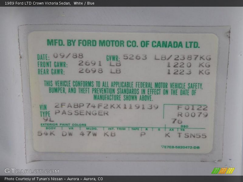 White / Blue 1989 Ford LTD Crown Victoria Sedan