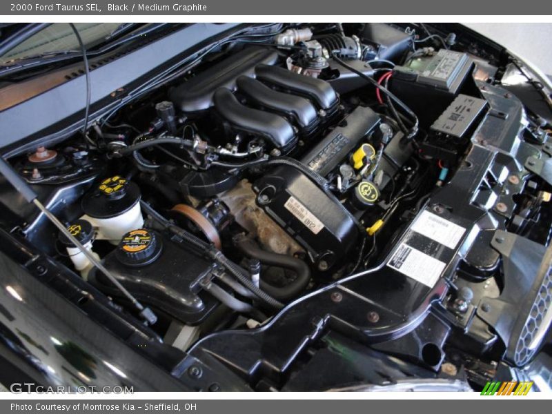 Black / Medium Graphite 2000 Ford Taurus SEL