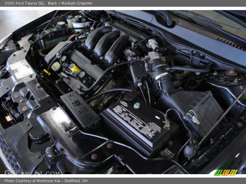 Black / Medium Graphite 2000 Ford Taurus SEL