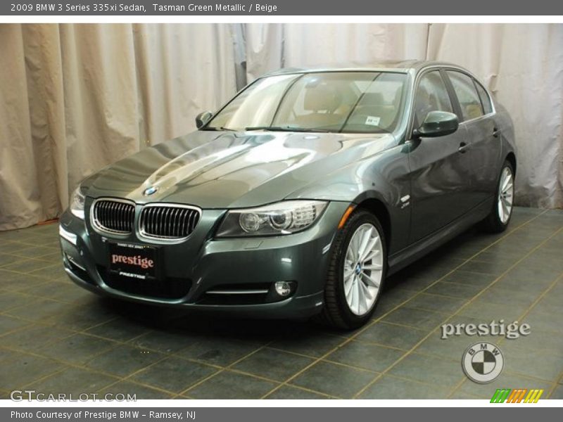 Tasman Green Metallic / Beige 2009 BMW 3 Series 335xi Sedan