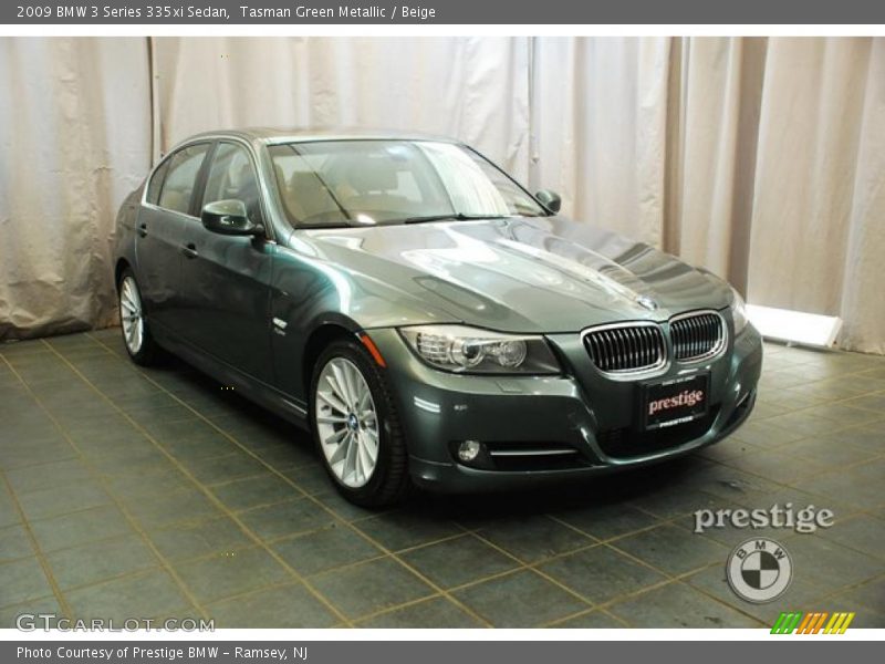 Tasman Green Metallic / Beige 2009 BMW 3 Series 335xi Sedan