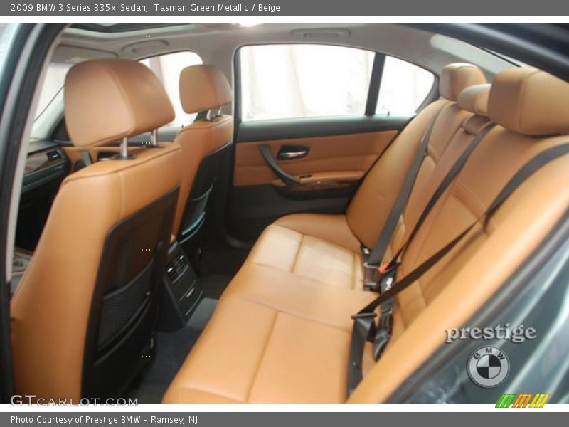 Tasman Green Metallic / Beige 2009 BMW 3 Series 335xi Sedan