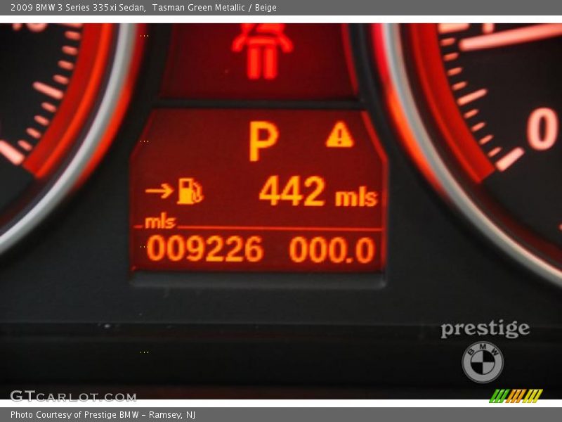 Tasman Green Metallic / Beige 2009 BMW 3 Series 335xi Sedan