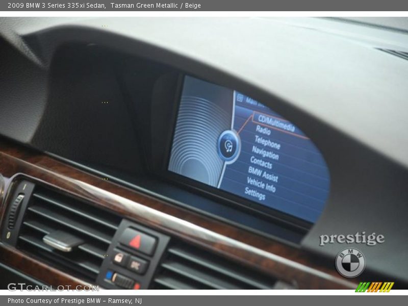 Tasman Green Metallic / Beige 2009 BMW 3 Series 335xi Sedan