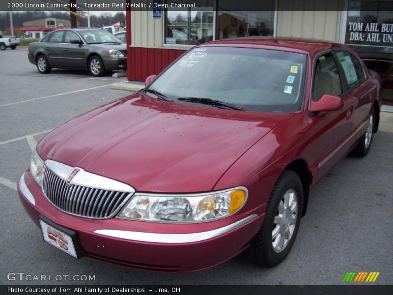 Toreador Red Metallic / Deep Charcoal 2000 Lincoln Continental