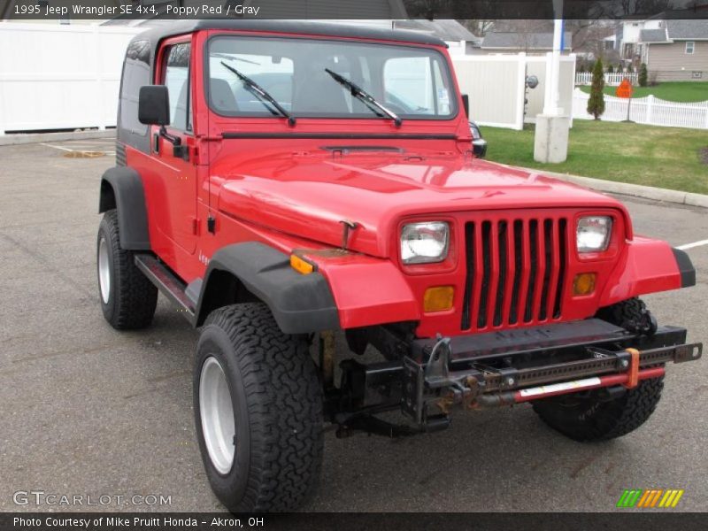 Poppy Red / Gray 1995 Jeep Wrangler SE 4x4