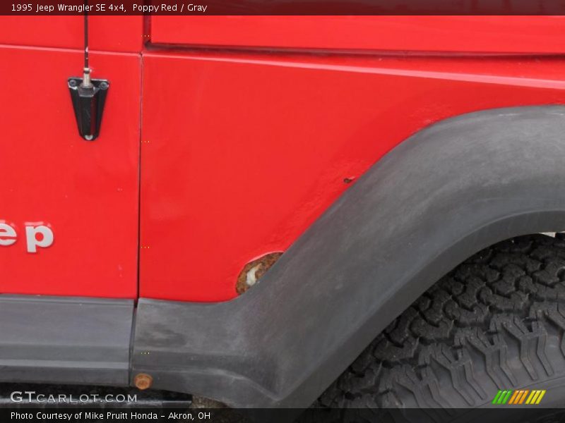 Poppy Red / Gray 1995 Jeep Wrangler SE 4x4