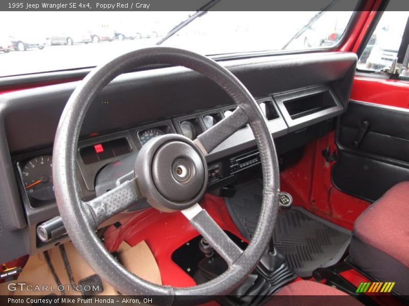 Poppy Red / Gray 1995 Jeep Wrangler SE 4x4