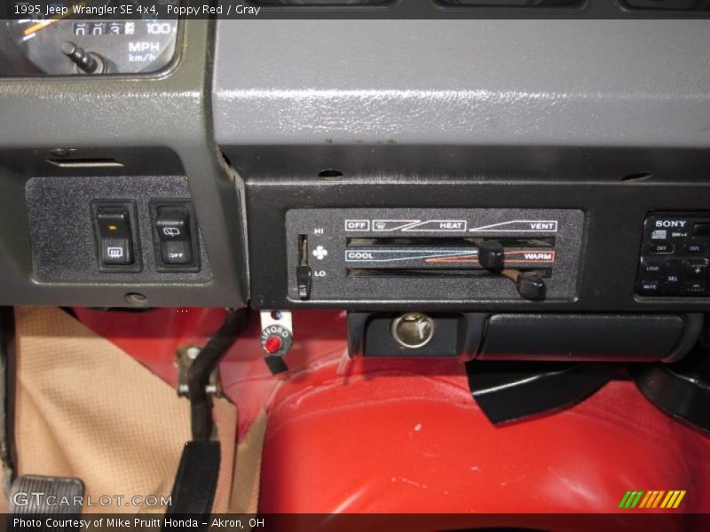 Poppy Red / Gray 1995 Jeep Wrangler SE 4x4