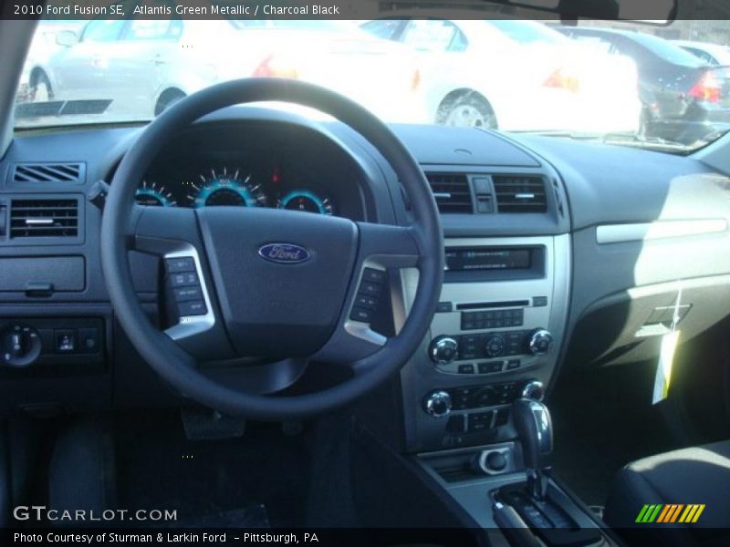 Atlantis Green Metallic / Charcoal Black 2010 Ford Fusion SE