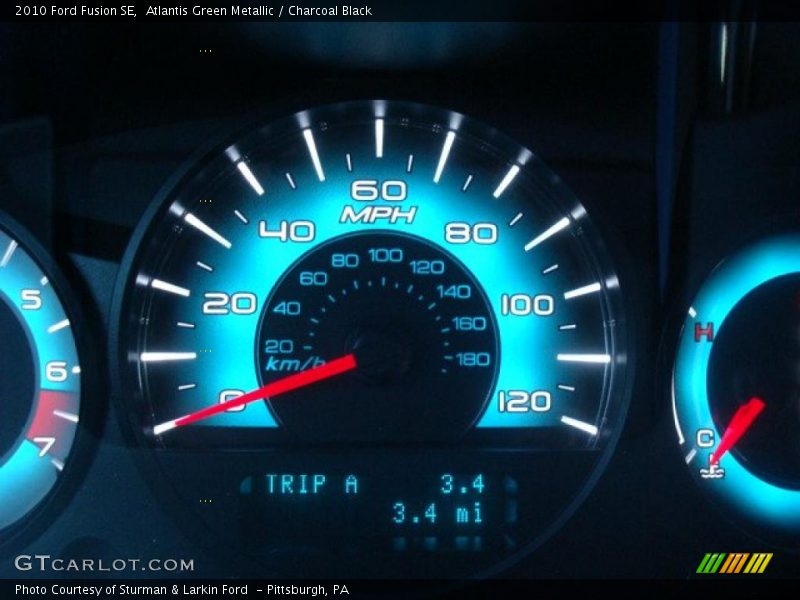 Atlantis Green Metallic / Charcoal Black 2010 Ford Fusion SE