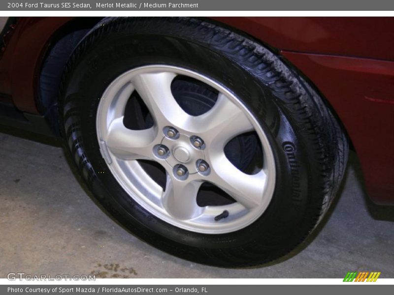 Merlot Metallic / Medium Parchment 2004 Ford Taurus SES Sedan