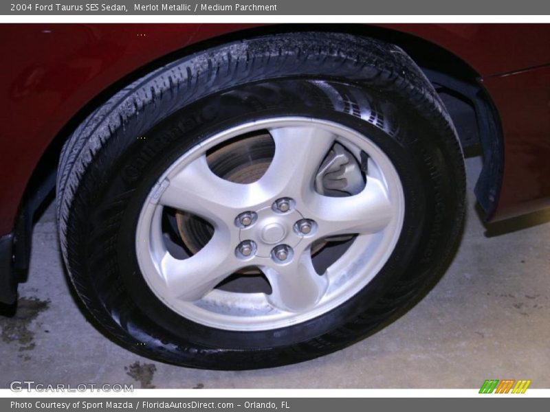 Merlot Metallic / Medium Parchment 2004 Ford Taurus SES Sedan