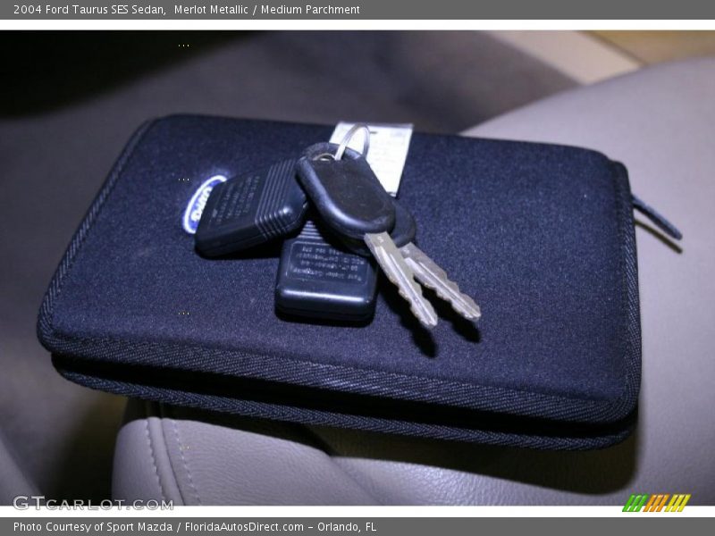 Merlot Metallic / Medium Parchment 2004 Ford Taurus SES Sedan