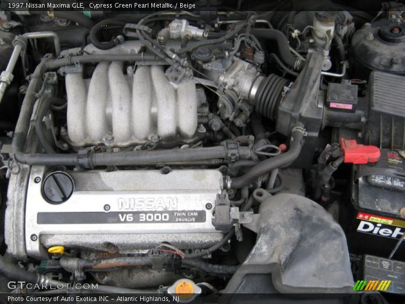 Cypress Green Pearl Metallic / Beige 1997 Nissan Maxima GLE