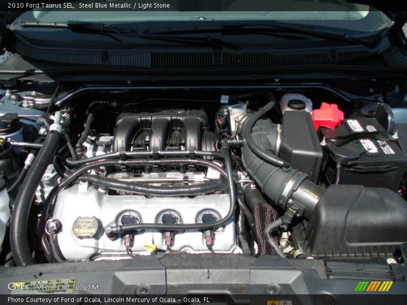 Steel Blue Metallic / Light Stone 2010 Ford Taurus SEL