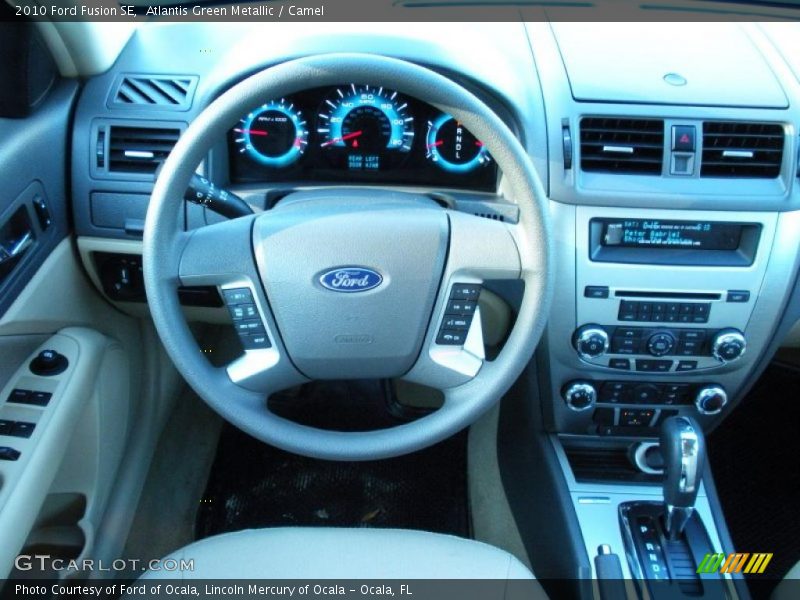 Atlantis Green Metallic / Camel 2010 Ford Fusion SE