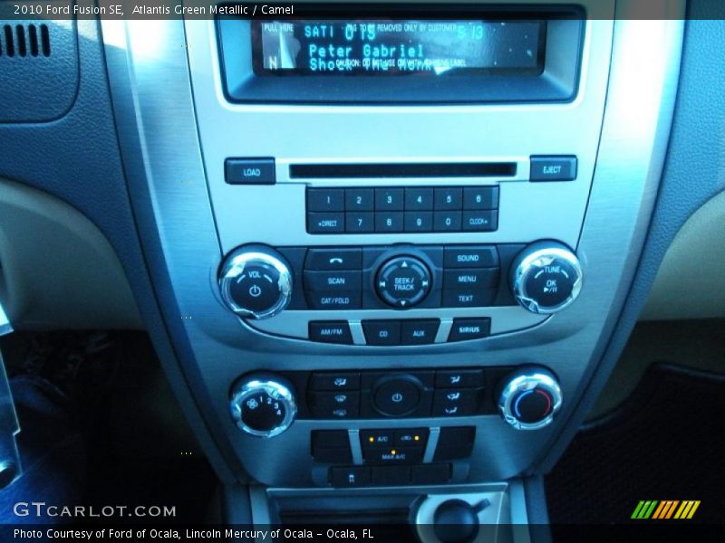 Atlantis Green Metallic / Camel 2010 Ford Fusion SE