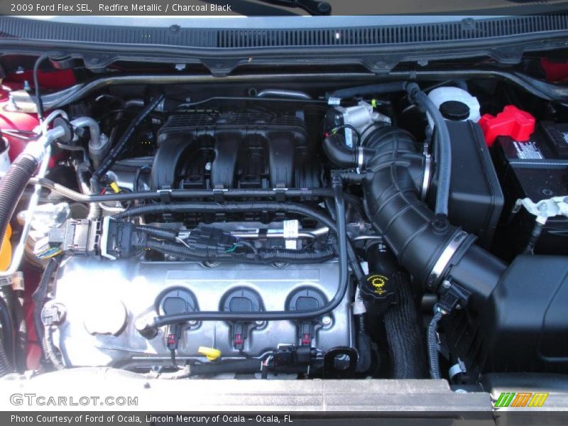 Redfire Metallic / Charcoal Black 2009 Ford Flex SEL