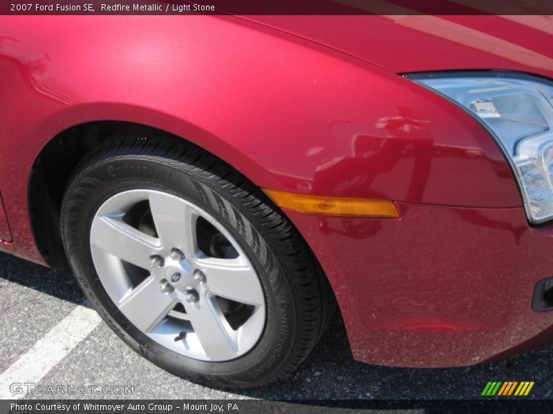 Redfire Metallic / Light Stone 2007 Ford Fusion SE