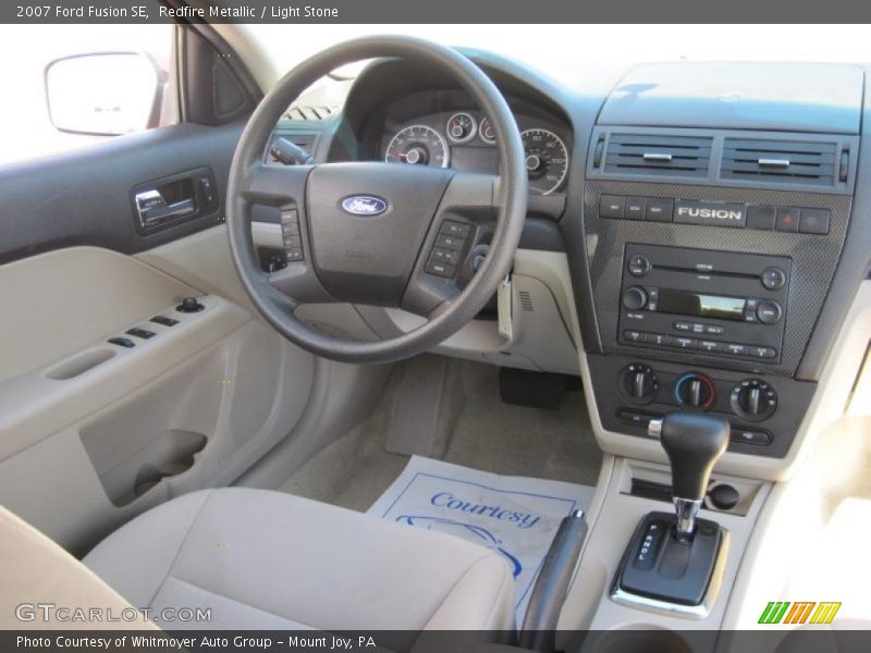 Redfire Metallic / Light Stone 2007 Ford Fusion SE