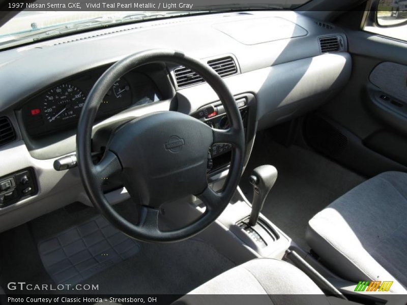 Vivid Teal Pearl Metallic / Light Gray 1997 Nissan Sentra GXE