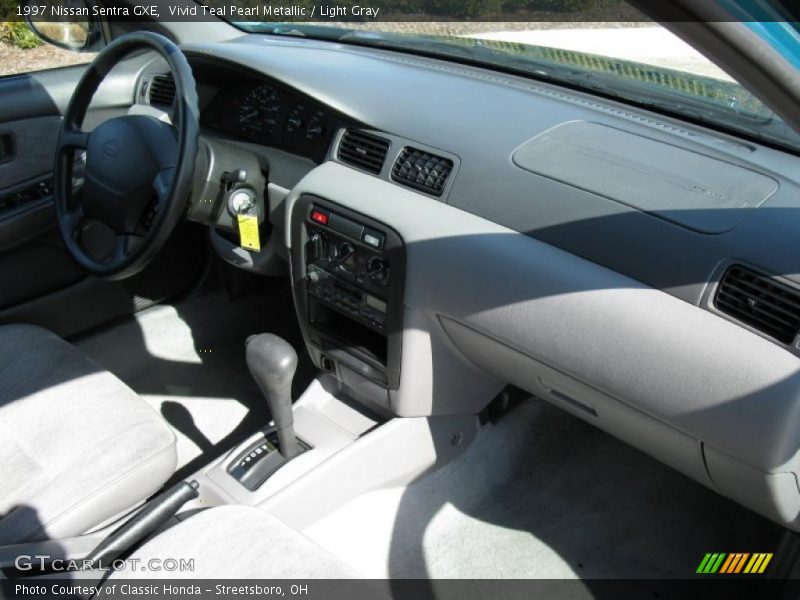 Vivid Teal Pearl Metallic / Light Gray 1997 Nissan Sentra GXE