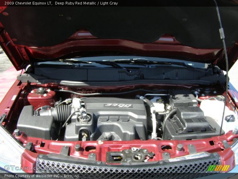 Deep Ruby Red Metallic / Light Gray 2009 Chevrolet Equinox LT