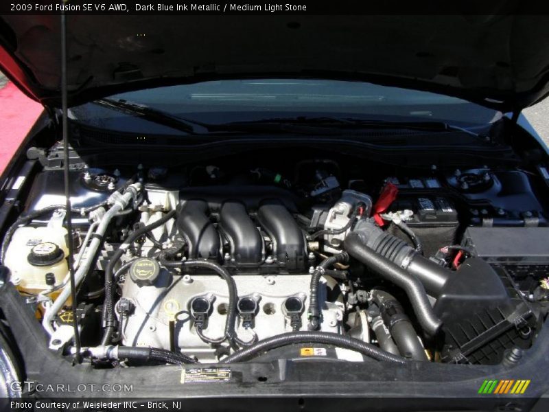Dark Blue Ink Metallic / Medium Light Stone 2009 Ford Fusion SE V6 AWD
