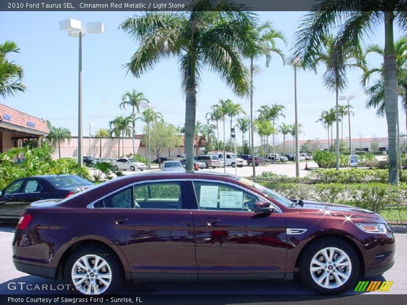 Cinnamon Red Metallic / Light Stone 2010 Ford Taurus SEL
