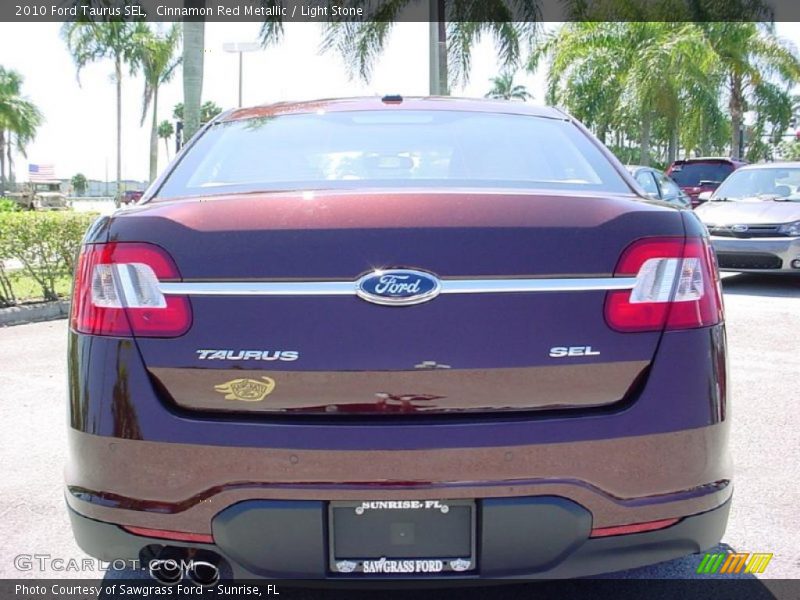 Cinnamon Red Metallic / Light Stone 2010 Ford Taurus SEL
