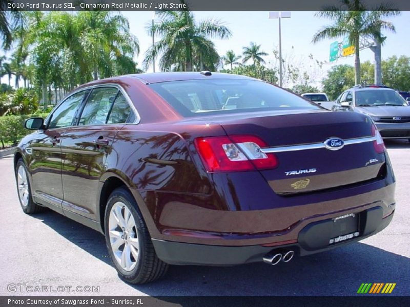 Cinnamon Red Metallic / Light Stone 2010 Ford Taurus SEL