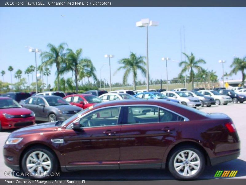 Cinnamon Red Metallic / Light Stone 2010 Ford Taurus SEL