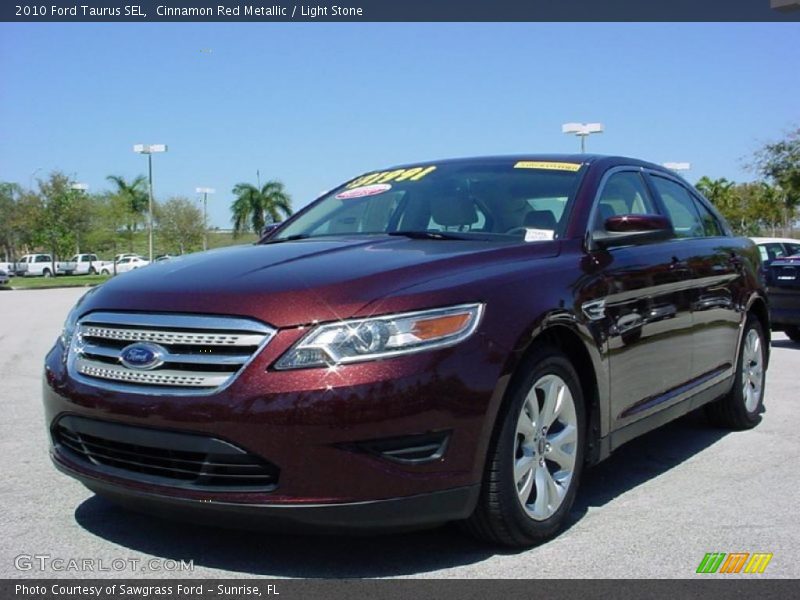 Cinnamon Red Metallic / Light Stone 2010 Ford Taurus SEL