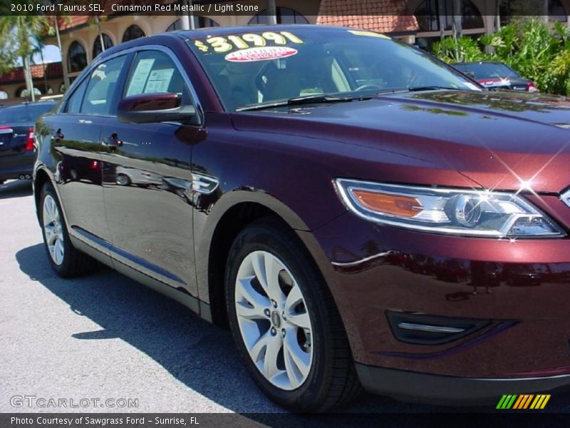 Cinnamon Red Metallic / Light Stone 2010 Ford Taurus SEL
