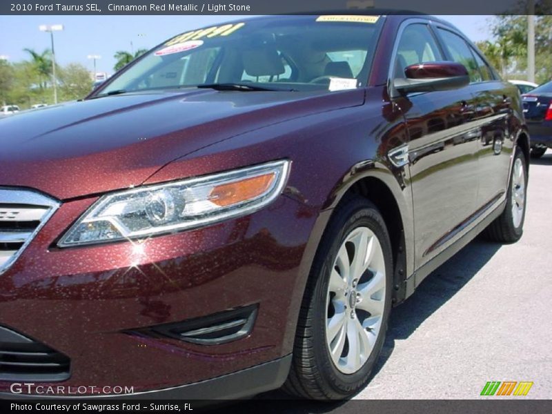 Cinnamon Red Metallic / Light Stone 2010 Ford Taurus SEL