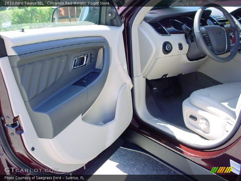 Cinnamon Red Metallic / Light Stone 2010 Ford Taurus SEL