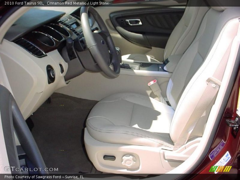Cinnamon Red Metallic / Light Stone 2010 Ford Taurus SEL